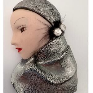 1980’s Profile Brooch with Feather and Rhinestone Accents